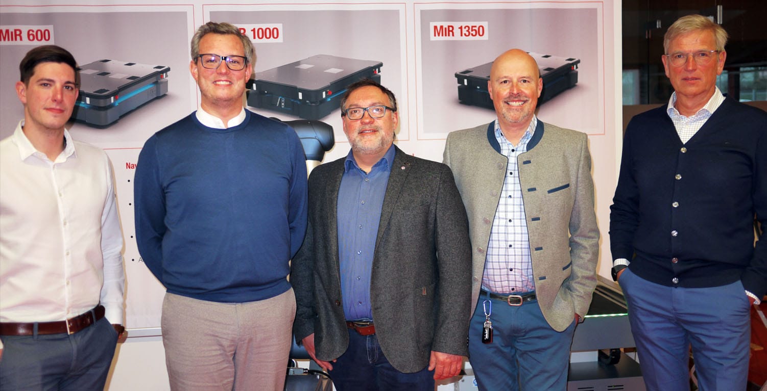 Fünf Männer auf einem Gruppenbild
